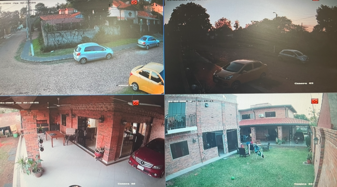Instalación profesional de cámara de seguridad CCTV tipo bullet en una pared exterior.